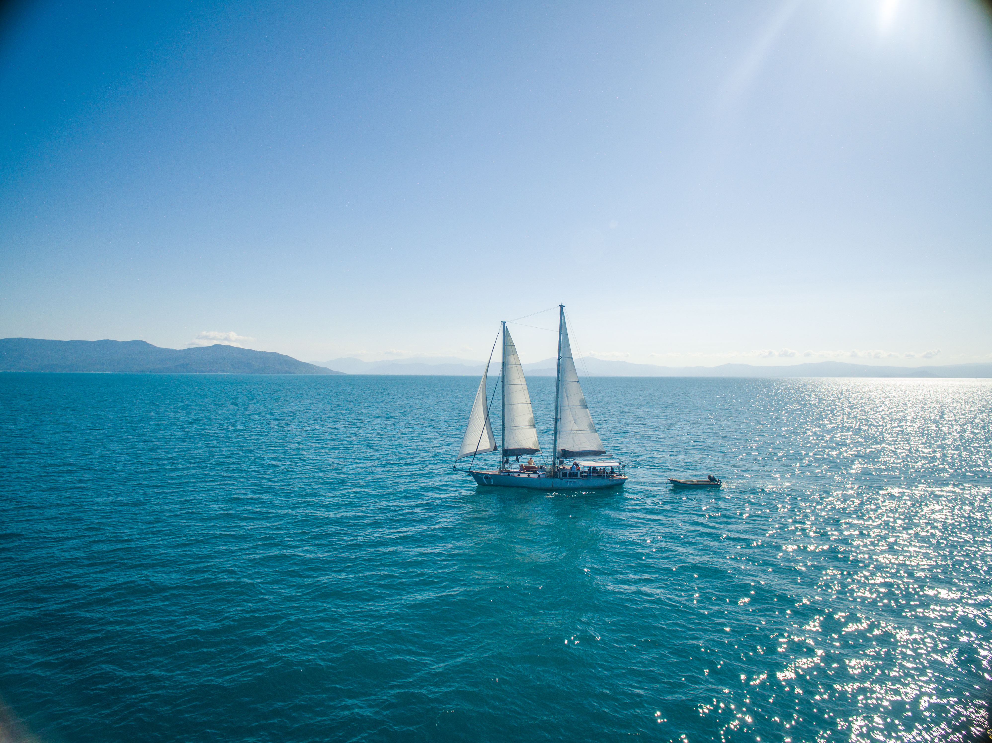 Ocean Free is a 16.5 metre sailing schooner. Check in at Reef Fleet Terminal from 7.15am at Ocean Free + Ocean Freedom desk. Board from 7.30am A Finger No. 4 at the Marlin Marina, Cairns for an 8am departure – coffee, tea and Danish pastries and fresh fruit served on boarding.